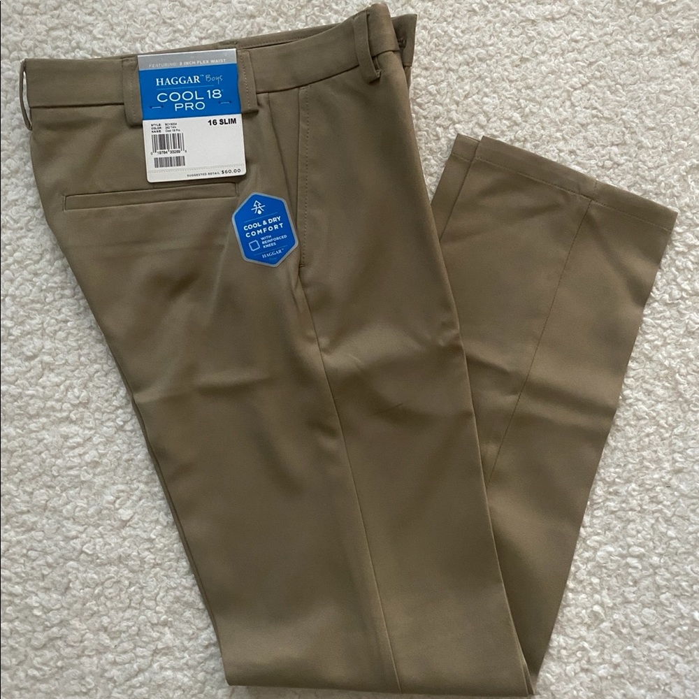 Haggar cool pro slim fit khaki pants. Brand new with tags. Boys size 16.